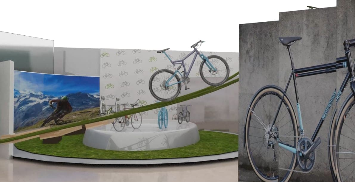 3D render of the GOGOBIKE central display: bikes on a round platform, a mountain bike climbing a green ramp, and a curved alpine cycling photo backdrop