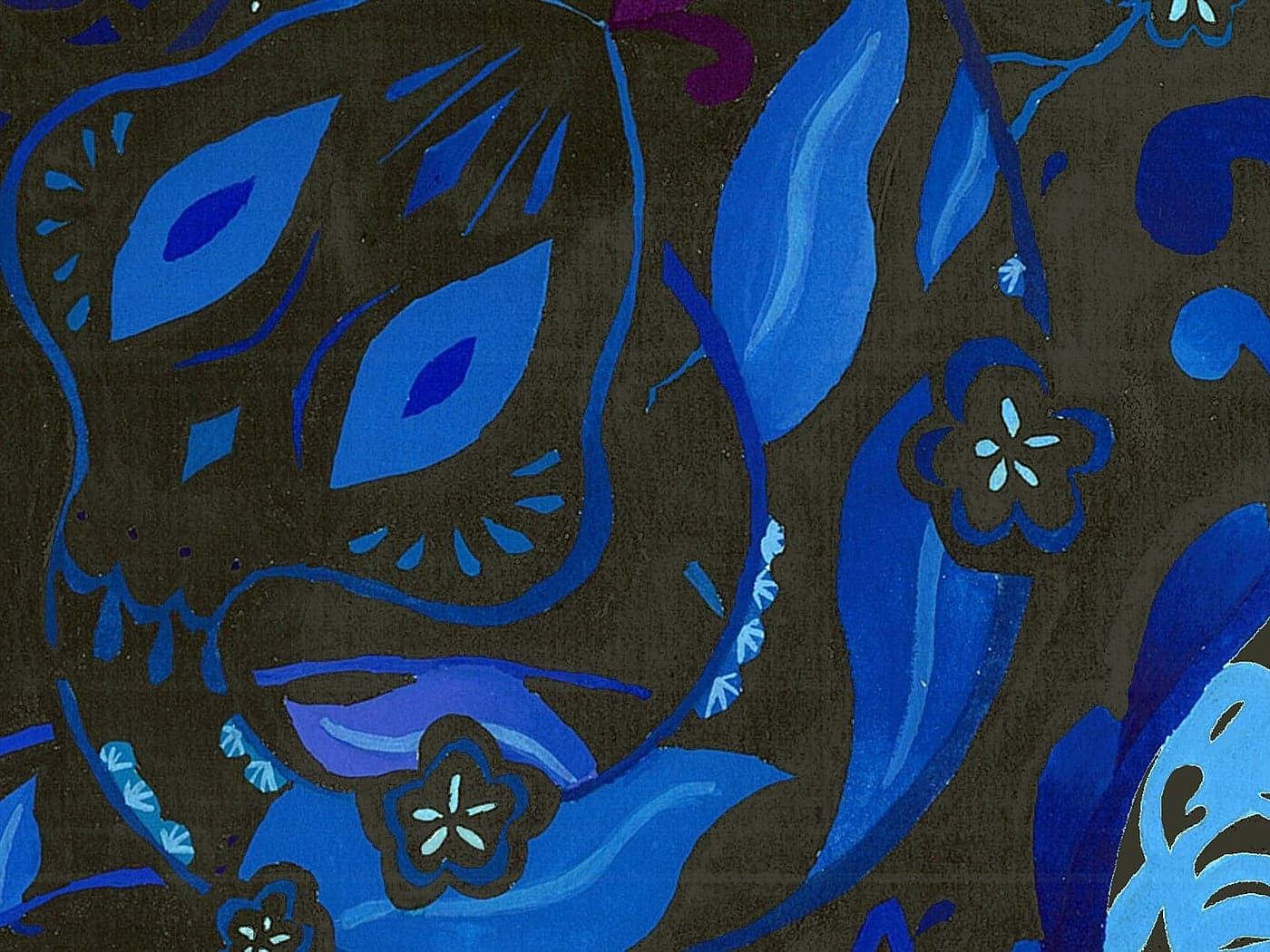 Detail of the blue snake's head: ornamental eye markings, layered blues and tiny white flower accents over the black ground